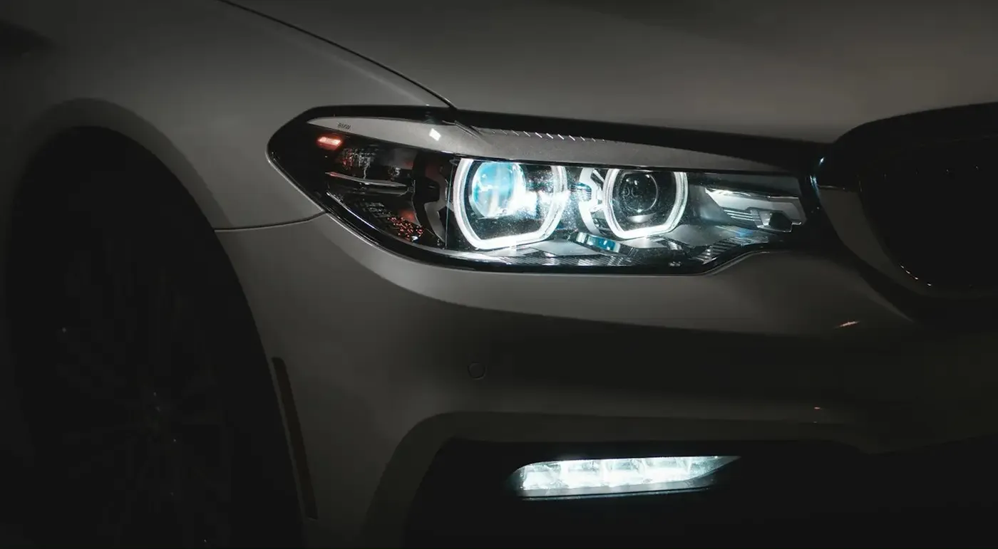 Clear LED headlight and clean paint after detailing; drag to compare with the oxidized, swirled before